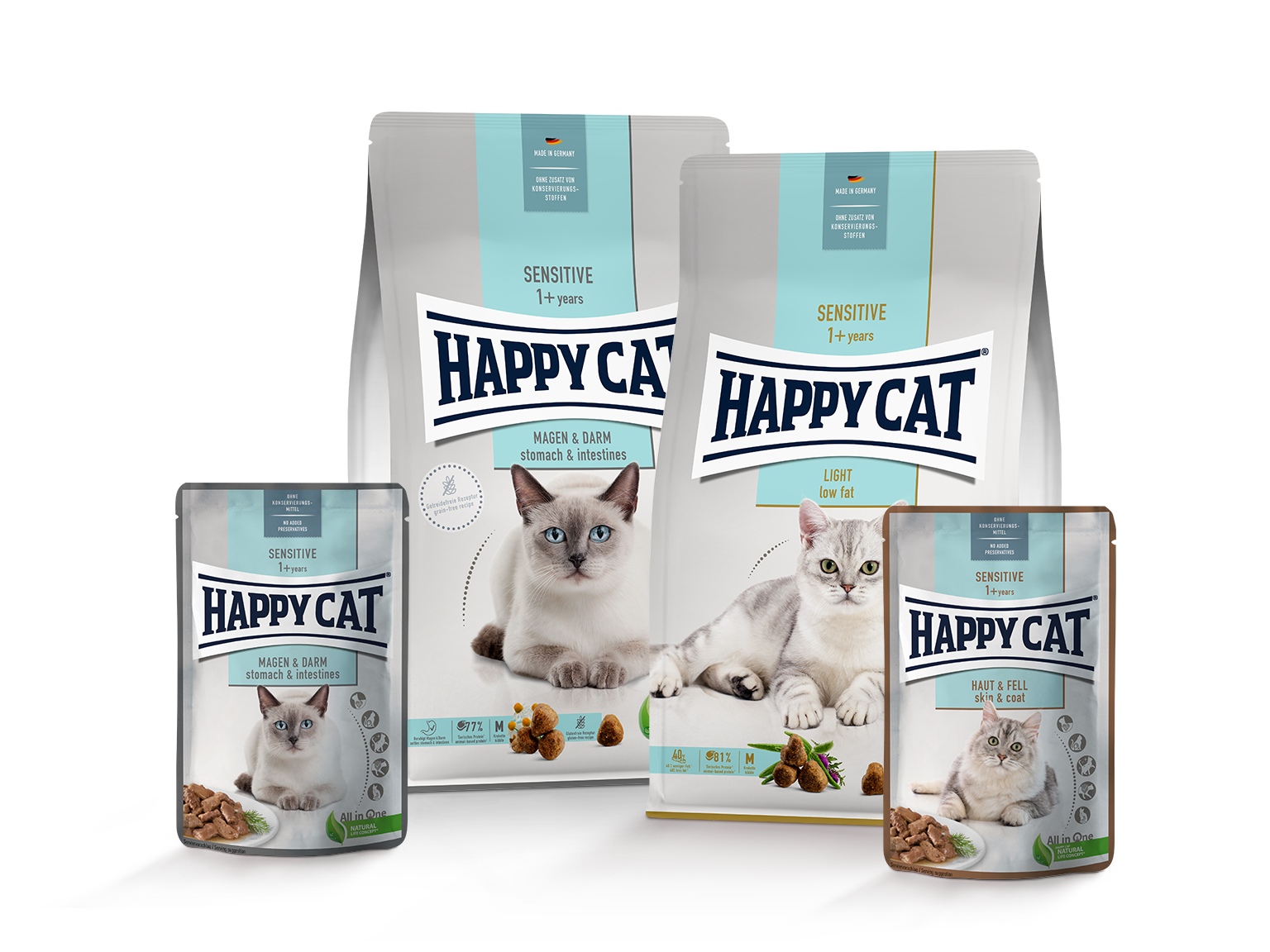 Vier Happy Cat Sensitive Packungen
