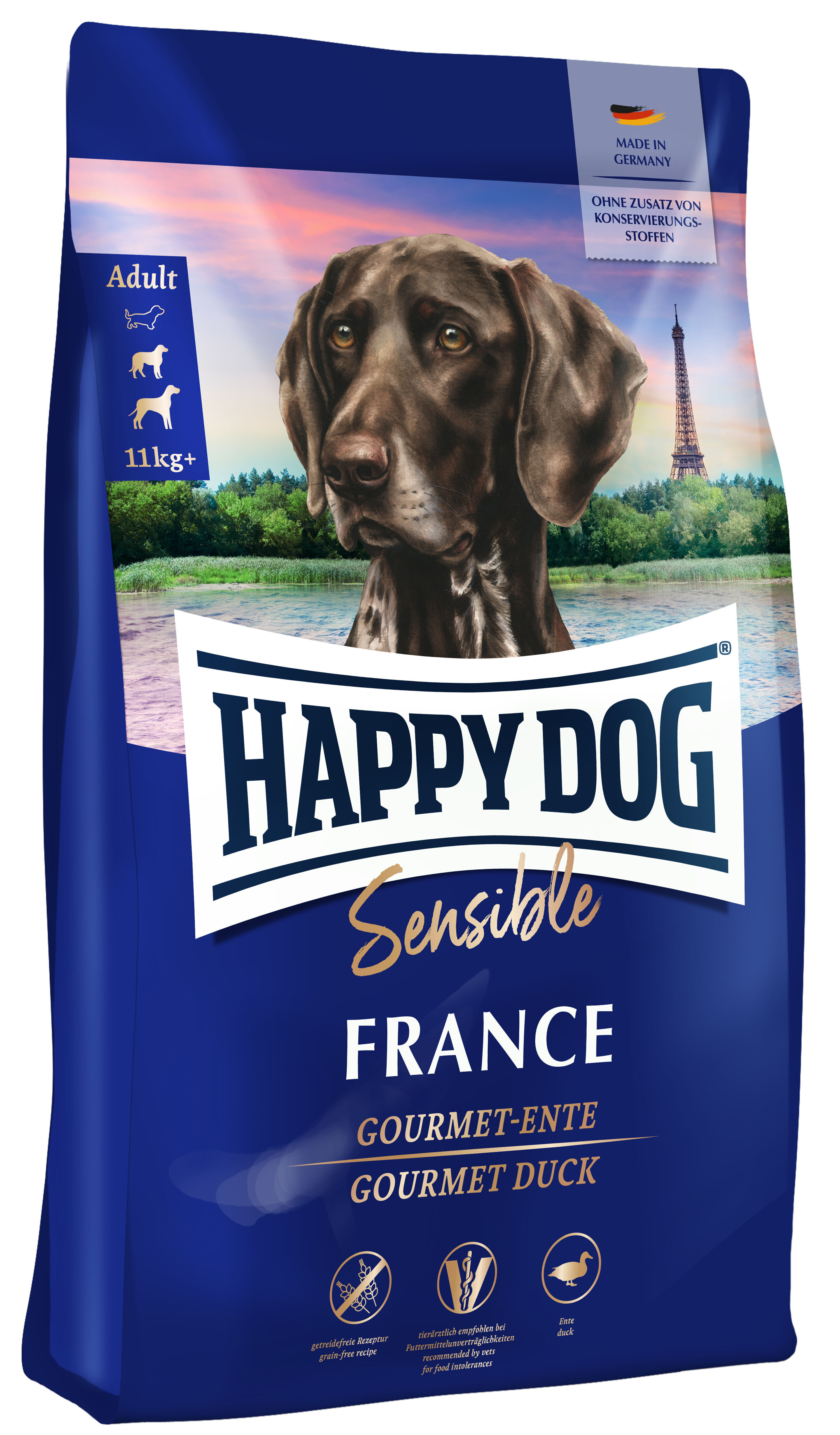Hundetrockenfutter von Happy Dog mit einem Hund und Eiffelturm. Text: "Sensible France Gourmet-Ente, Made in Germany, ohne Zusatz von Konservierungsstoffen, getreidefreie Rezeptur".
