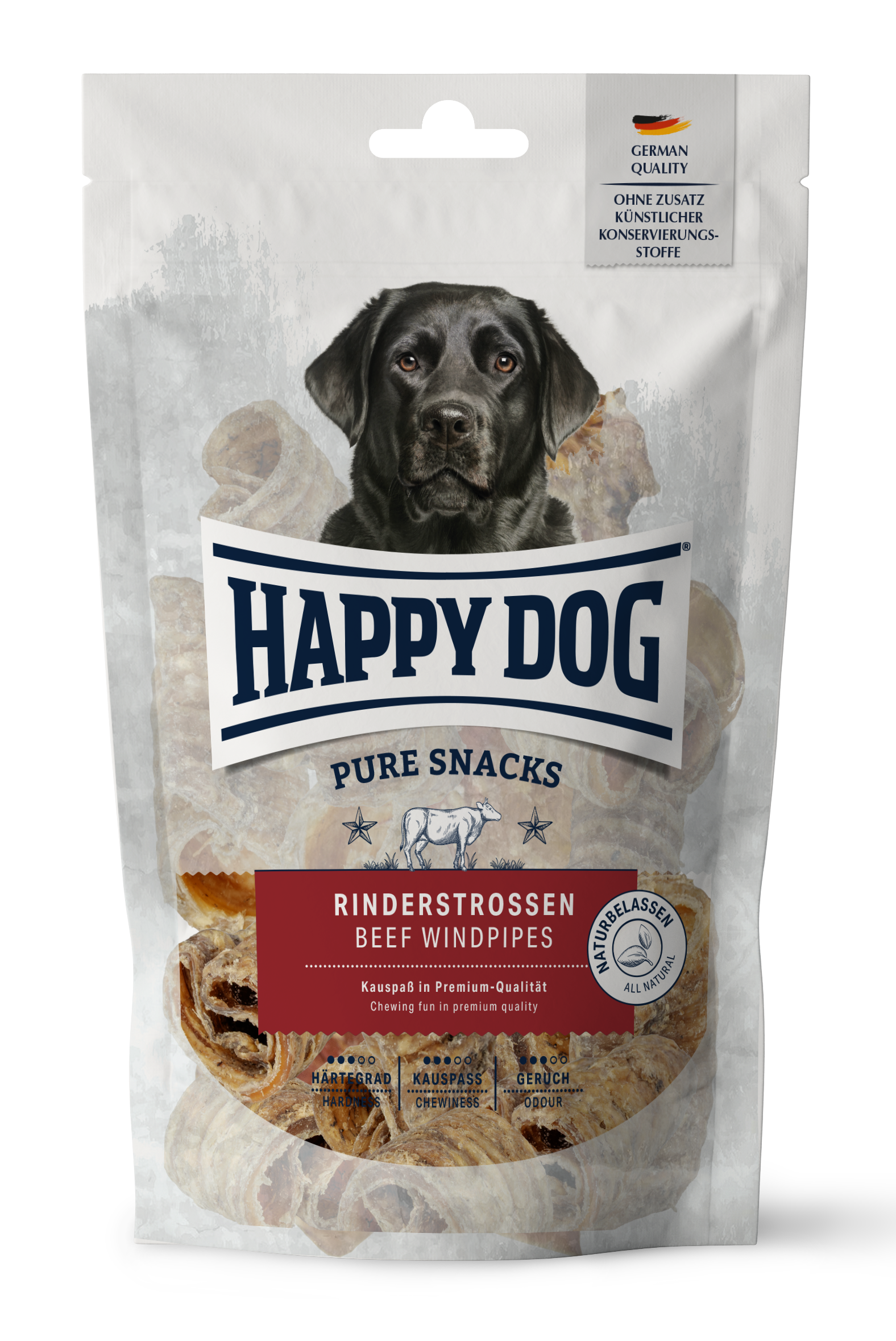 Verpackung mit Hundebild und Text „HAPPY DOG PURE SNACKS RINDERSTROSSEN BEEF WINDPIPES“, „Made in Germany“, „Ohne Zusatz von Konservierungsstoffen“. Enthält Illustrationen für Härtegrad, Kaupass, und Geruch.
