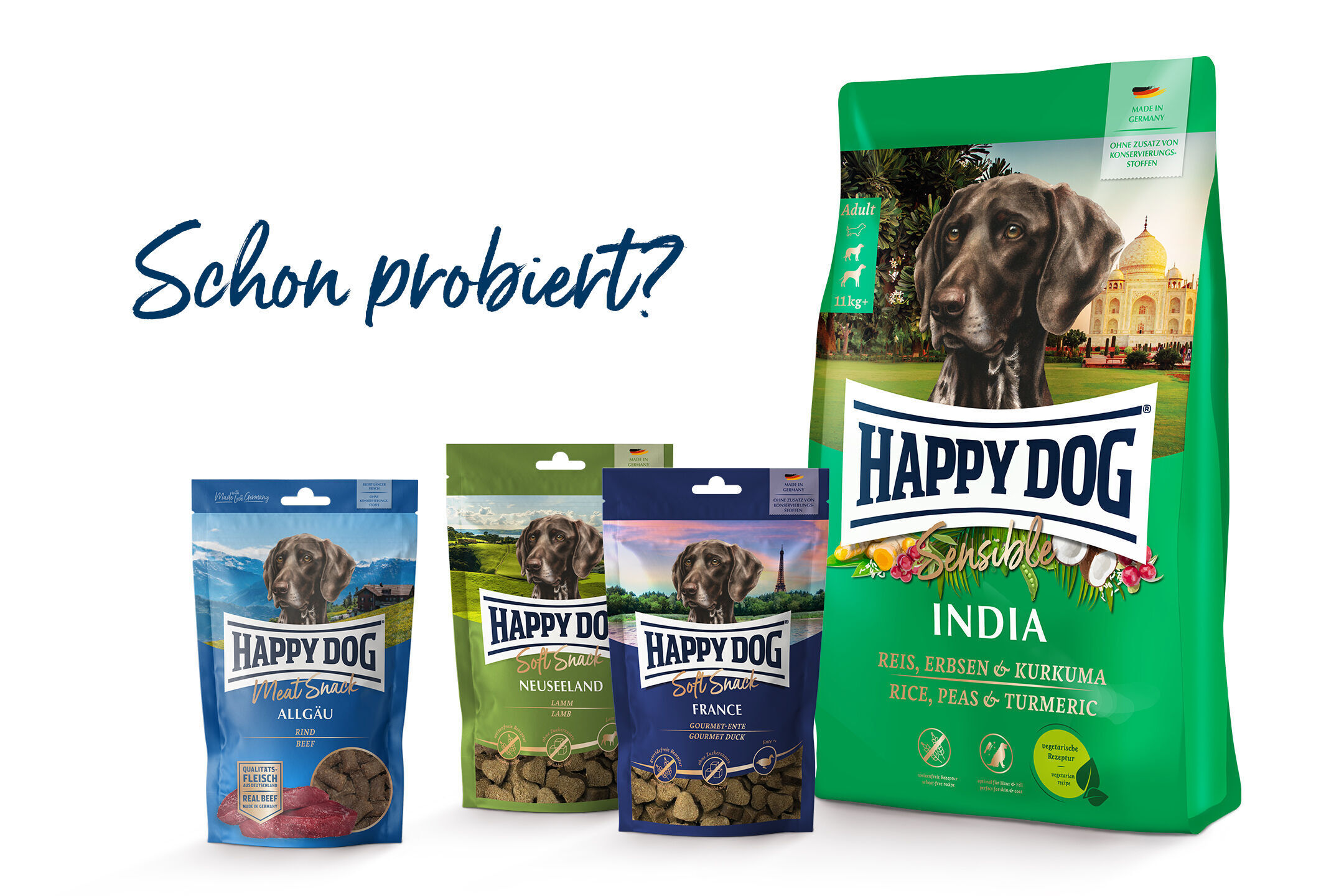 Hundefutter-Verpackungen von Happydog mit verschiedenen Geschmacksrichtungen, darunter "India". Text: "Schon probiert?".