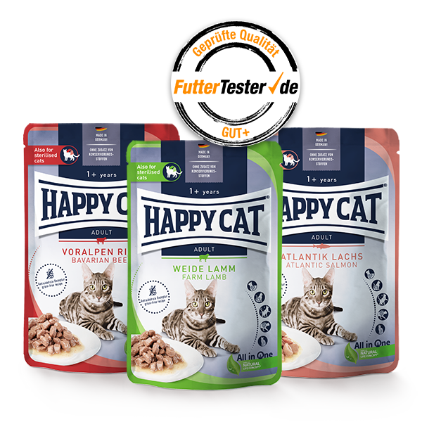 Drei verschiedene Packungen Happy Cat Nassfutter Meat in Sauce mit FutterTester-Siegel Gut+