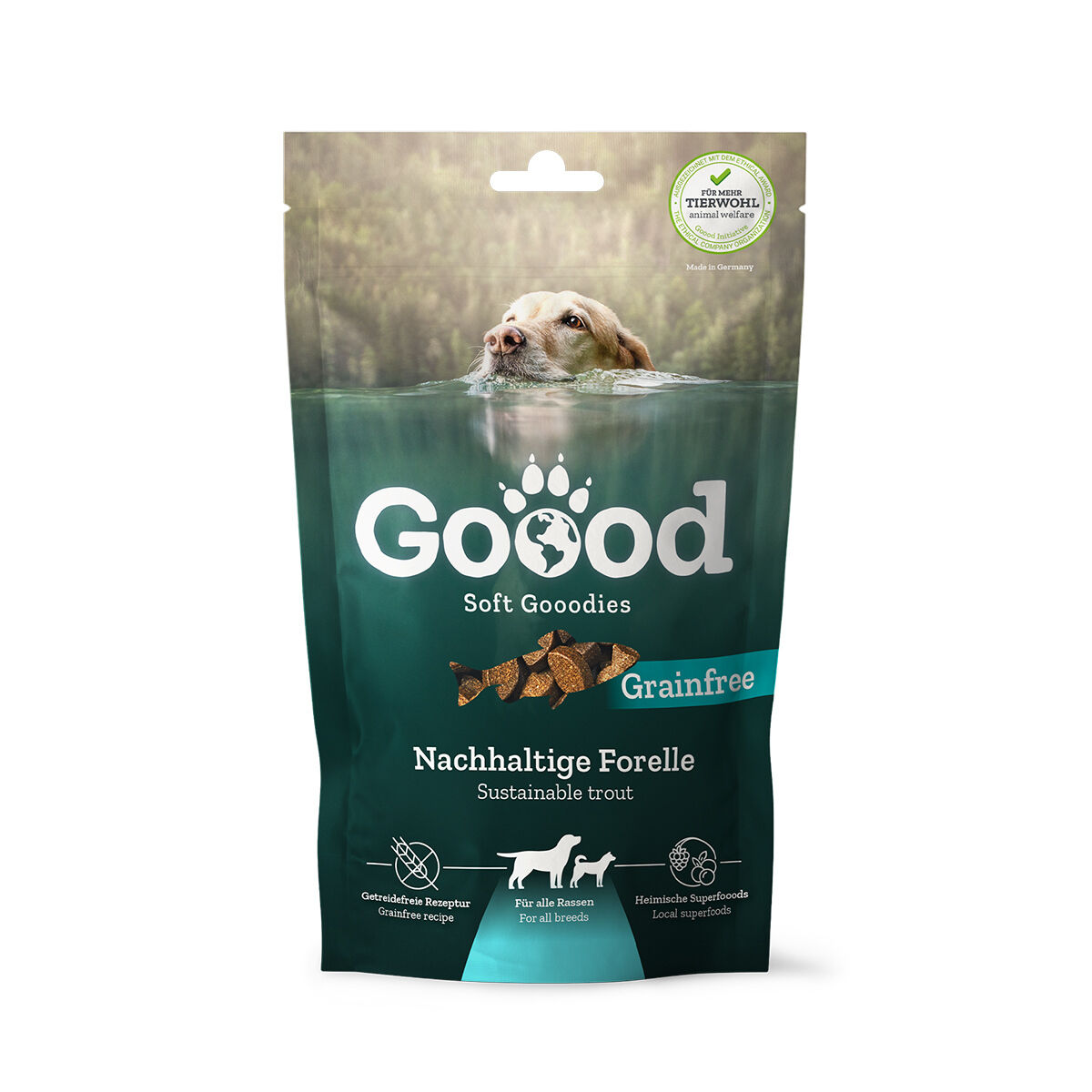 Hund, der in einem See schwimmt; Verpackung mit Text: "Goood Soft Gooodies, Grainfree, Nachhaltige Forelle, Sustainable trout, Getreidefreie Rezeptur, Für alle Rassen, Heimische Superfoods".