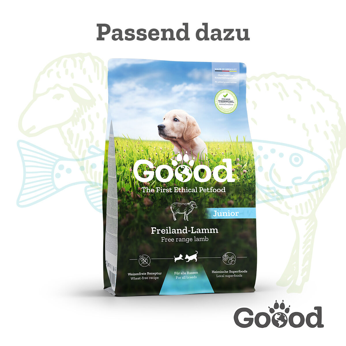 Verpackung für Hunde-Trockenfutter mit Lammgeschmack; enthält ein Bild eines Welpen in einer Wiese. Text: „Passend dazu“, „Goood“, „Freiland-Lamm“, „Junior“, „Weizenfreie Rezeptur“, „Für alle Rassen“, „Heimische Superfoods“.
