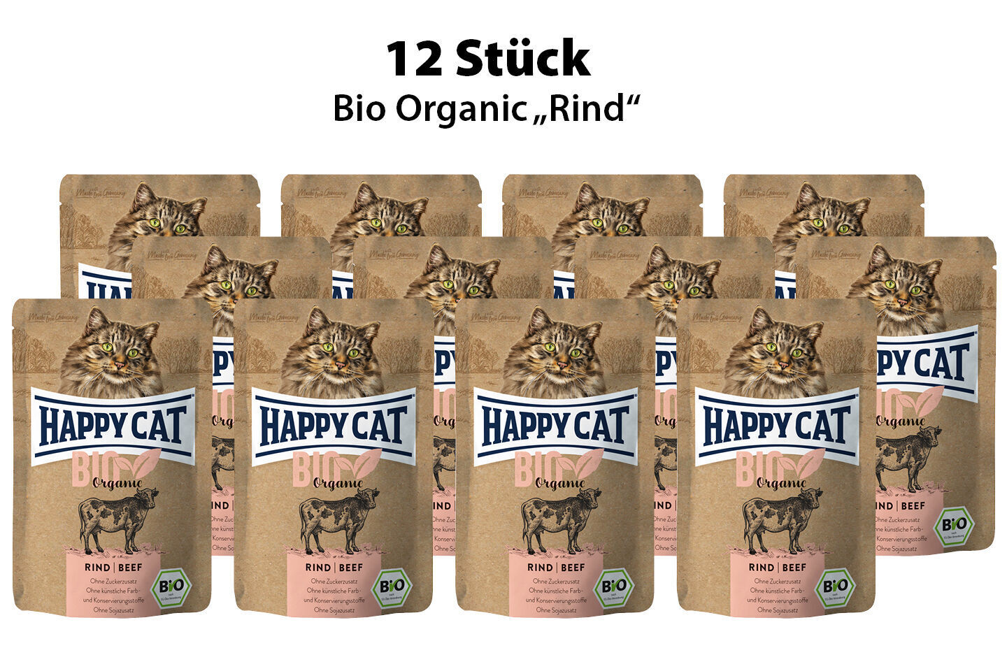 Zwölf Packungen Happy Cat Bio Organic Rind Katzenfutter. Verpackung zeigt Katzengesicht, Bio-Zertifikat, Schrift "Ohne Zuckerzusatz, ohne künstliche Farb- und Konservierungsstoffe, ohne Sojazusatz".