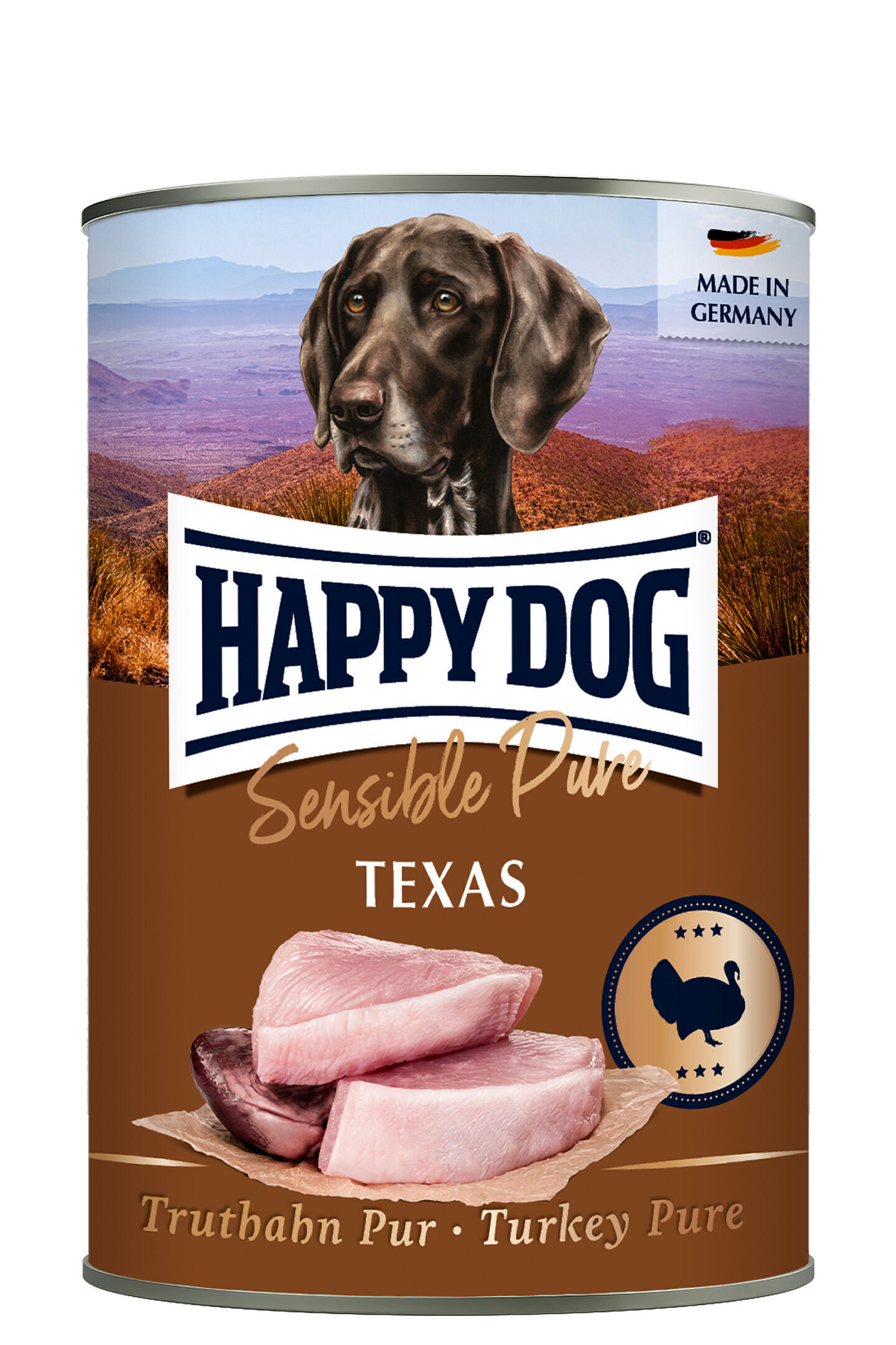 Hundefutterdose mit Hundebild, Text "HAPPY DOG", "Sensible Pure", "TEXAS", "Truthahn Pur - Turkey Pure", Landschaftshintergrund, deutscher Herkunftsvermerk "MADE IN GERMANY".