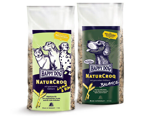 Alte Produktverpackungen von Happy Dog NaturCroq in den Sorten Lamm und Reis und Balance.