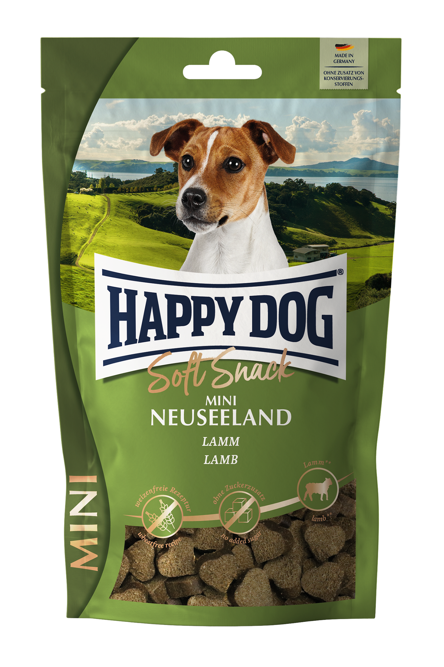 Verpackung von Happydog Soft Snack Mini Neuseeland mit einem Hund auf grünem Hintergrund; Text: "Ohne Zusatz von Konservierungsstoffen", "Lamm", "Weizenfreie Rezeptur", "Ohne Zuckerzusatz".