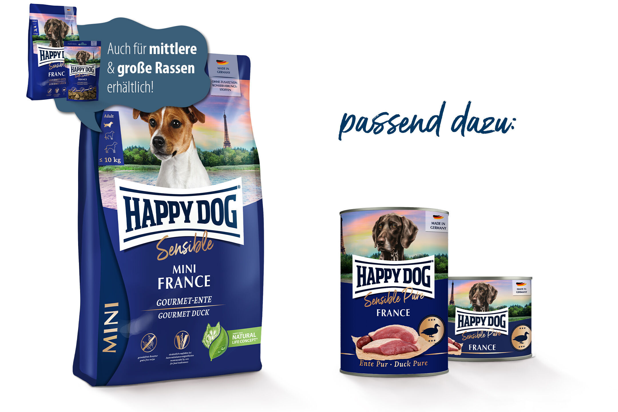 Happydog-Hundefutterverpackungen in Blau mit Hundebildern, einem Eiffelturm-Hintergrund und Text: "Auch für mittlere & große Rassen erhältlich!" sowie "passend dazu:" mit Dosenabbildungen.