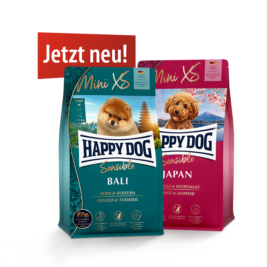 Darstellung der Produktverpackungen von Happy Dog Mini XS Sensible in den Sorten Bali und Japan. Das Banner Jetzt neu! ist beigefügt.