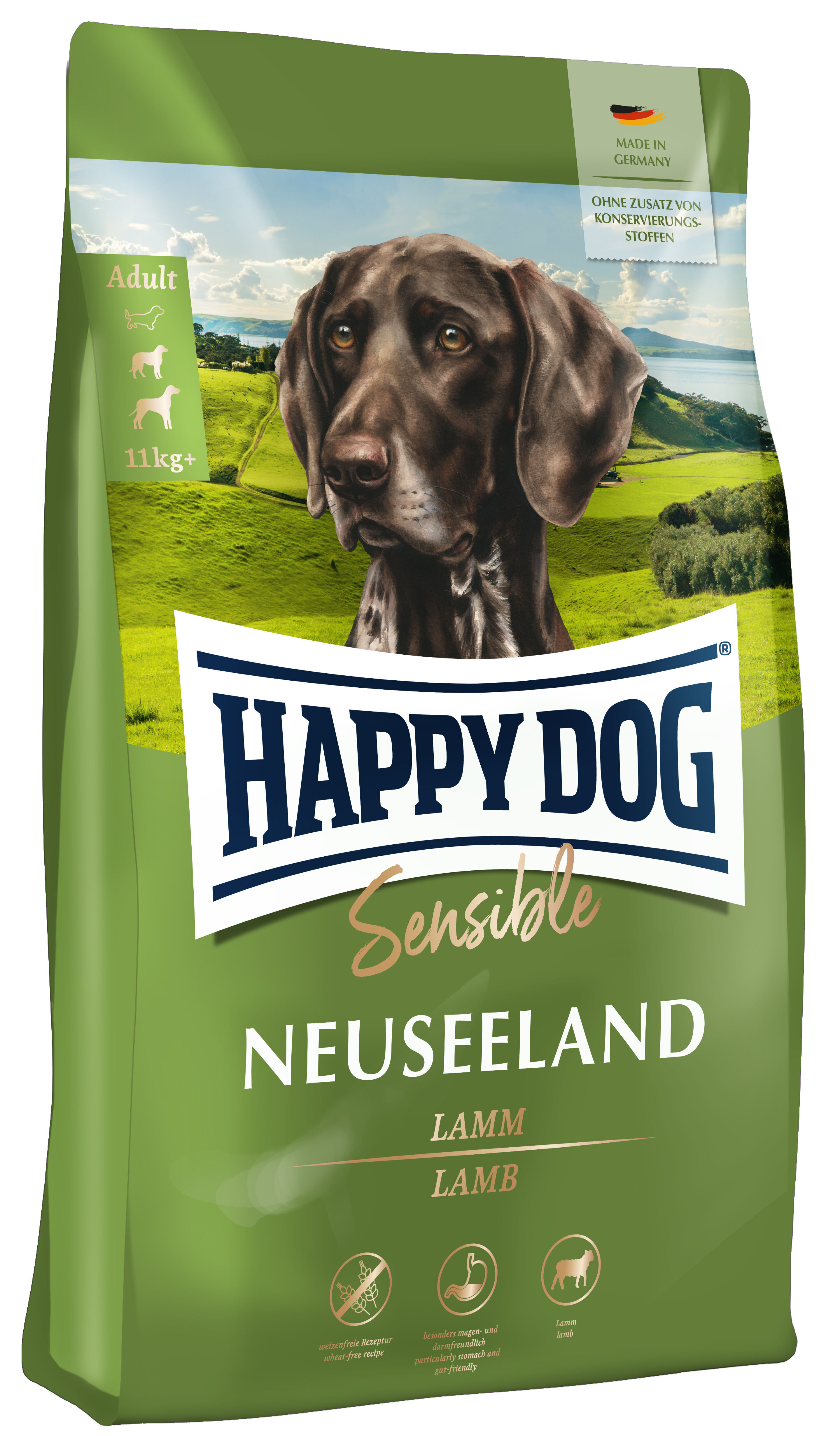 Hundefutter-Verpackung mit Hundebild, grüner Landschaft und Schriftzug "HAPPY DOG Sensible Neuseeland Lamm". Aufschrift: "Made in Germany", "Ohne Zusatz von Konservierungsstoffen", "Adult", "11 kg+".