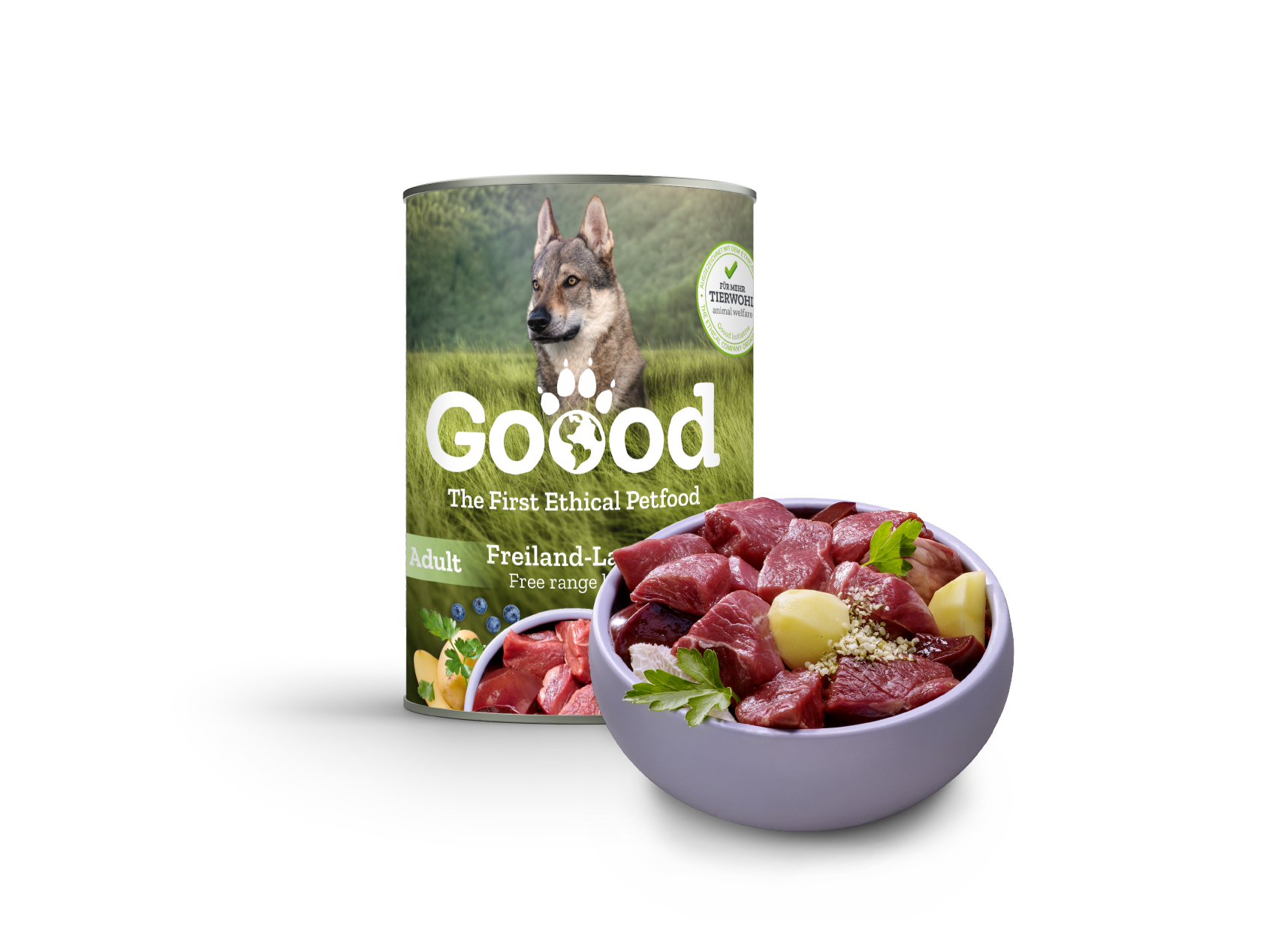Eine Nassfutter Dose in der Sorte Lamme der Marke Goood steht hinter einem Hundenapf befüllt mit Fleisch und Gemüse.