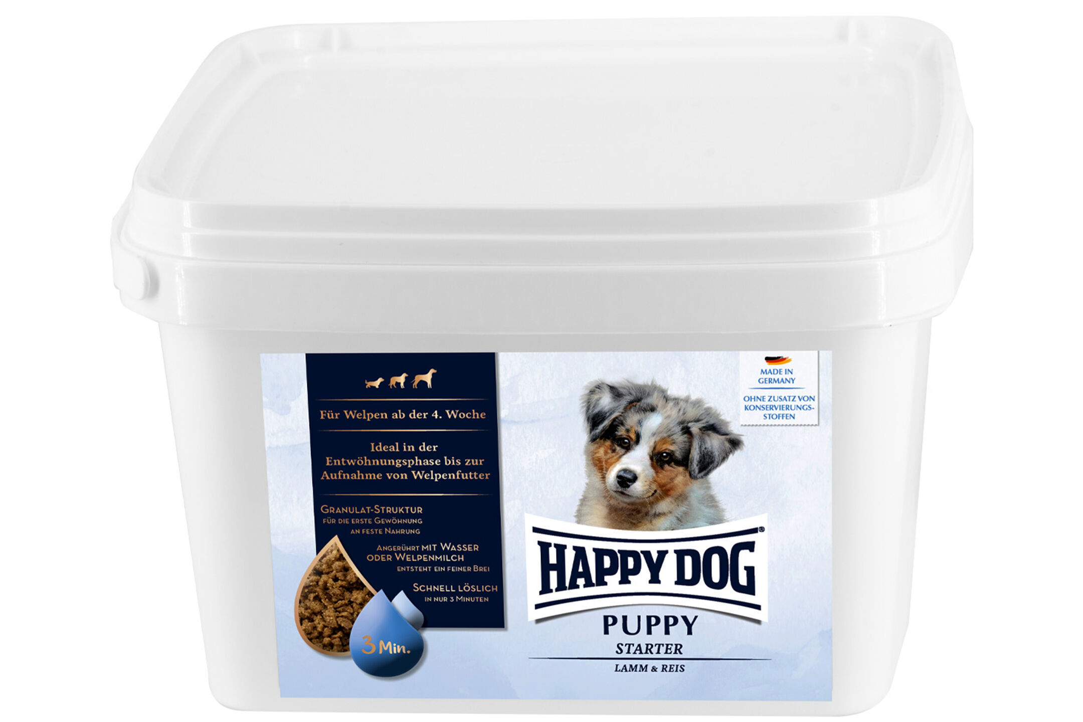 Puppy Starter - Lamb & Rice Ein weißer Futtermittelbehälter mit der Aufschrift „HAPPYDOG Puppy Starter Lamm & Reis“ zeigt ein Welpenbild. Ideal für die Entwöhnungsphase ab der vierten Woche. Made in Germany.
