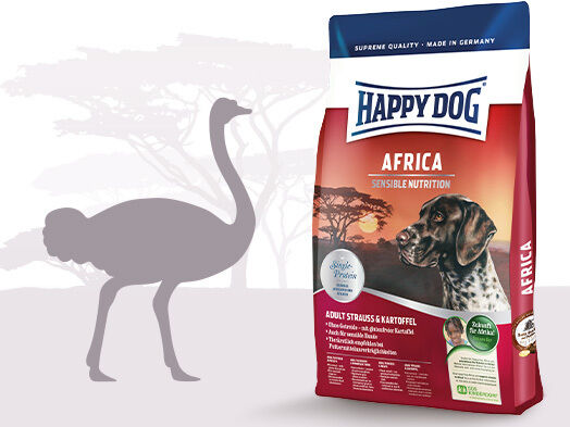 Darstellung der Produktverpackung von Happy Dog in der Sorte Africa. Ein Strauss in grau ist daneben abgebildet.