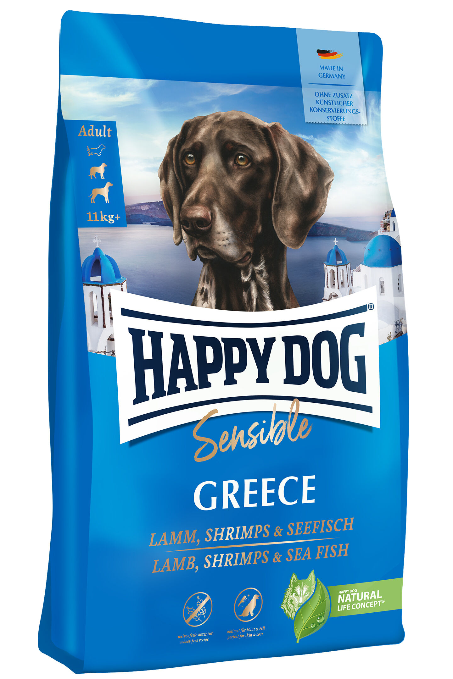 Blauer Happydog-Sensible-Beutel zeigt großen Hund, Ozeanhintergrund und griechische Architektur. Text: "GREECE LAMM, SHRIMPS & CALAMARI". Enthält keine Konservierungsstoffe, hergestellt in Deutschland, für erwachsene Hunde.
