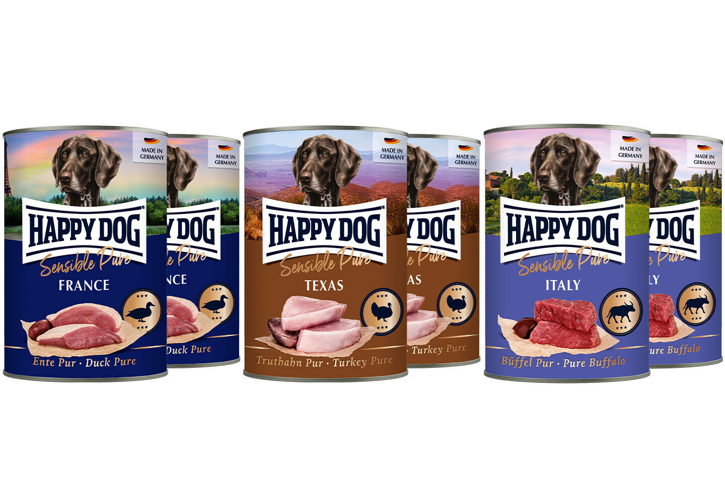 Sensible Pure Mixpaket Fünf Dosen Heimtiernahrung von Happy Dog mit verschiedenen Geschmacksrichtungen: Ente, Truthahn, Büffel. Jede Dose trägt den Aufdruck „Made in Germany“.