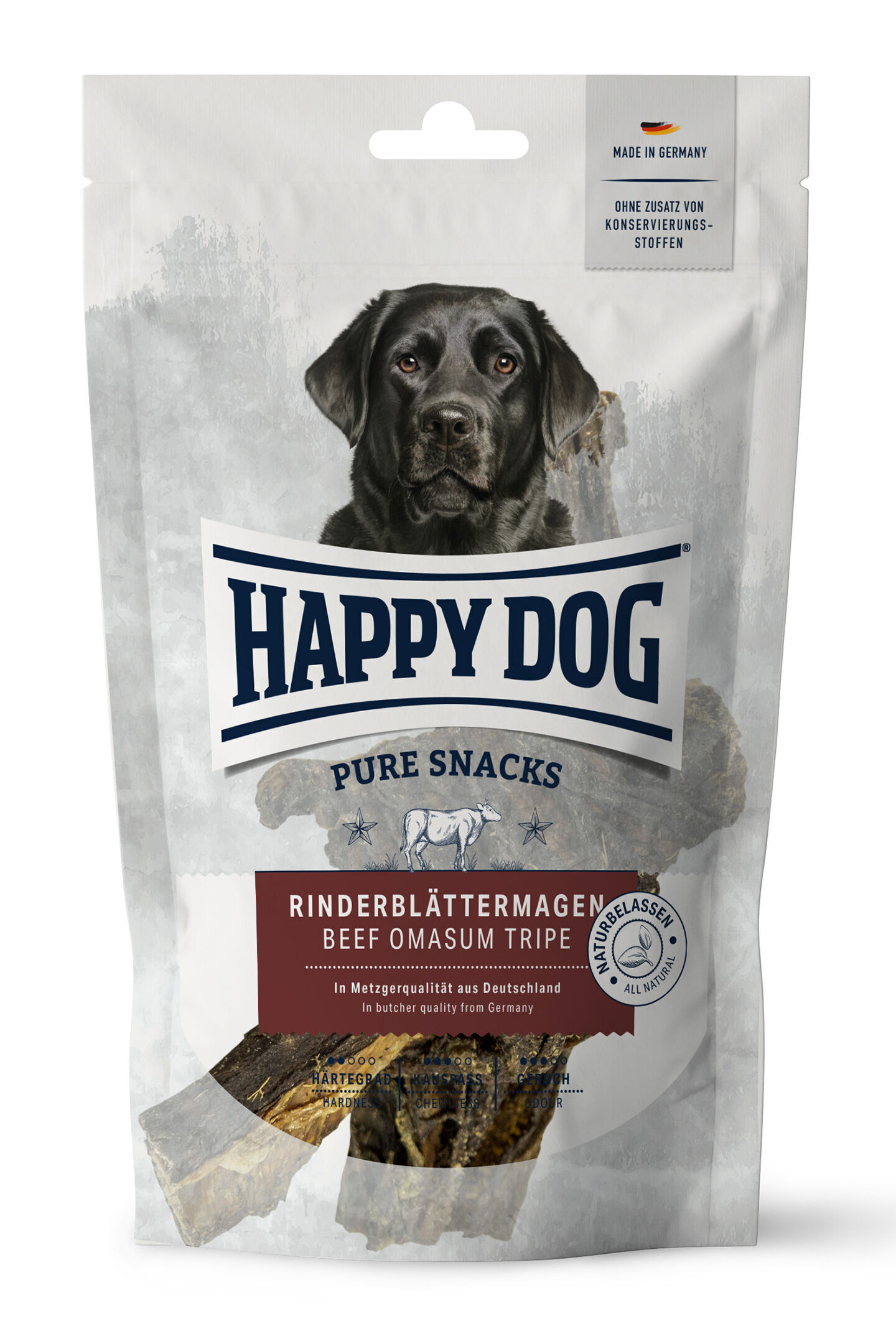 Hundesnack-Verpackung mit Labrador-Bild, Marke "Happydog". Text: "Made in Germany", "Ohne Zusatz von Konservierungsstoffen", "Rinderblättermagen", "In Metzgerqualität aus Deutschland", "Naturbelassen".
