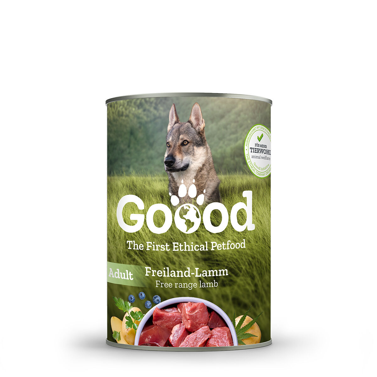 Eine Dose „Goood“ Hundefutter mit Freiland-Lamm, illustriert mit einem Hund in grüner Landschaft. Text: „The First Ethical Petfood“ und „Für mehr Tierwohl“. Enthält Abbildungen von Zutaten.