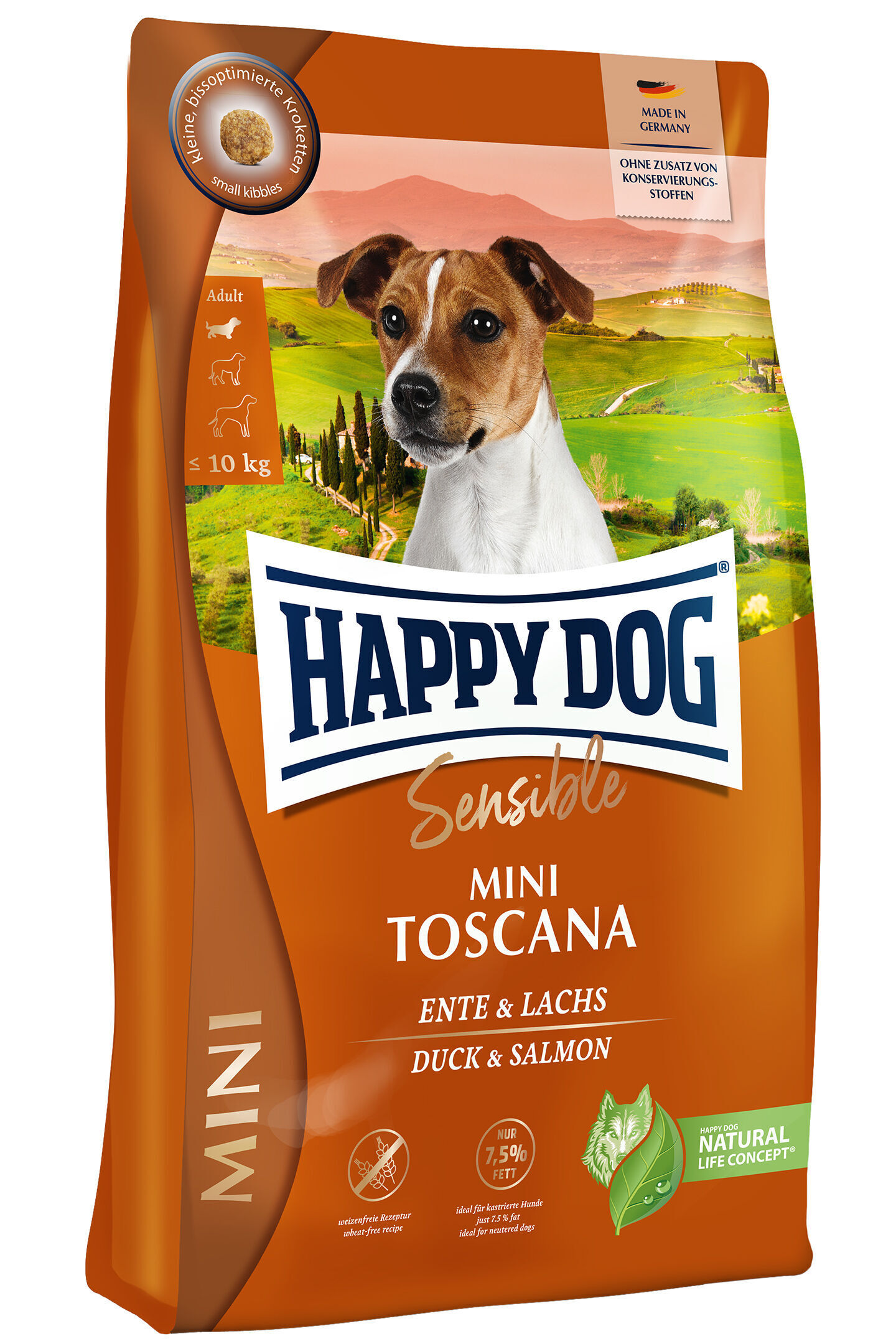 Verpackung von Happydog Sensible Mini Toscana Hundefutter mit Enten- und Lachsgeschmack, abgebildet ist ein Hund vor toskanischer Landschaft. Text zeigt u.a. "Made in Germany" und "ohne Zusatz von Konservierungsstoffen".